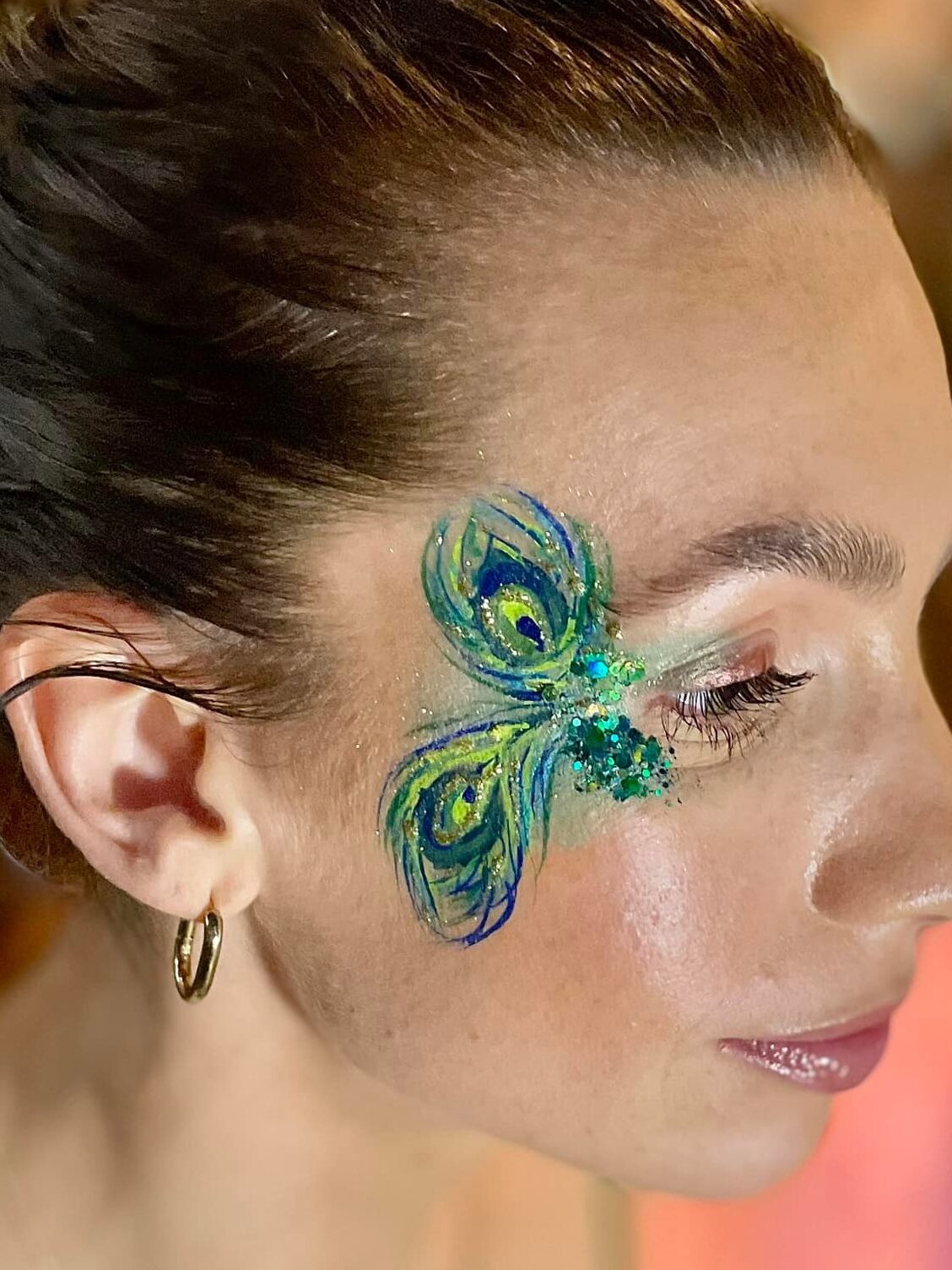 Adult face paint glitter at london corporate event
