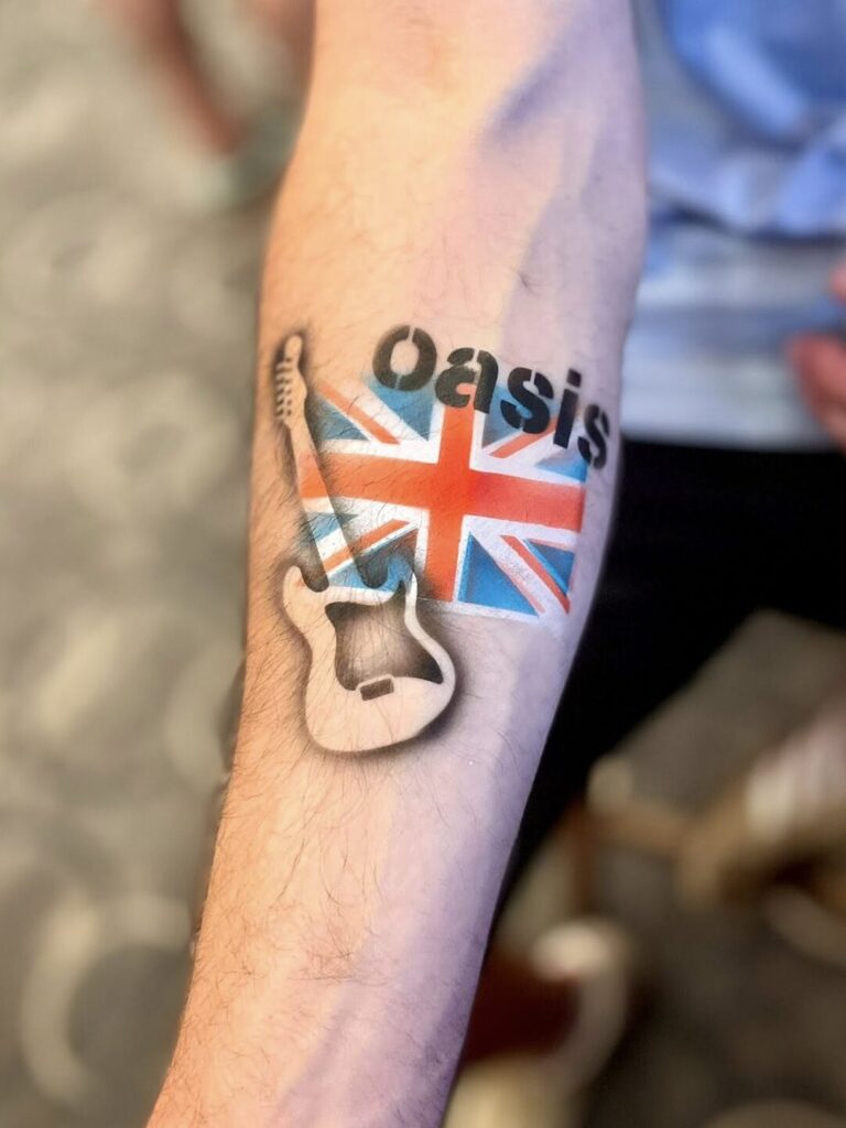 Aibrush tattoo at Oasis concert London Wembley Stadium