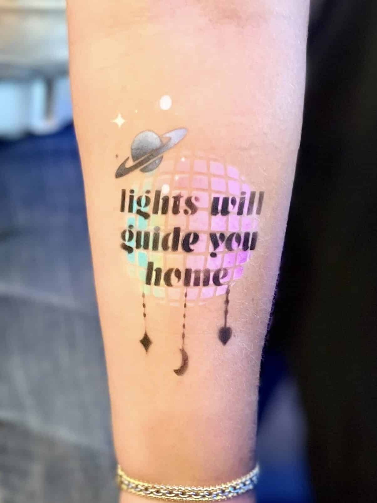 Airbrush tattoo at Coldplay concert London Wembley Stadium