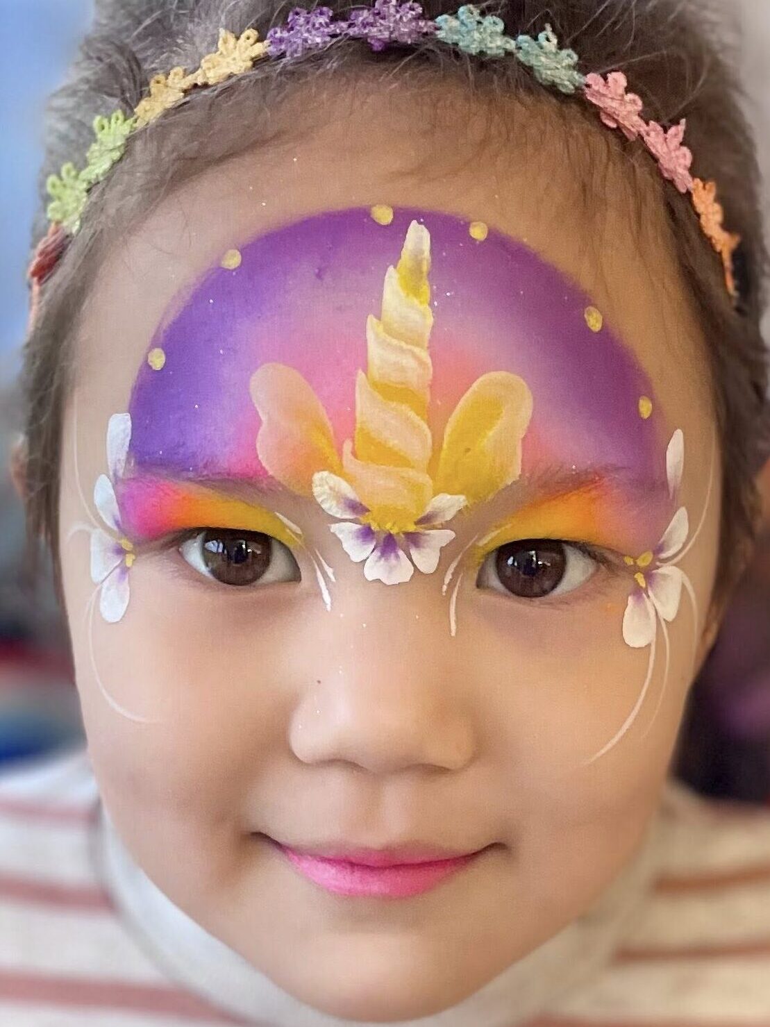 girl with a unicorn face paint in dartford